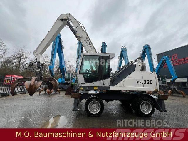 Fuchs Terex MHL 320 / Polyp/ Liftkabine/ Wheeled excavators