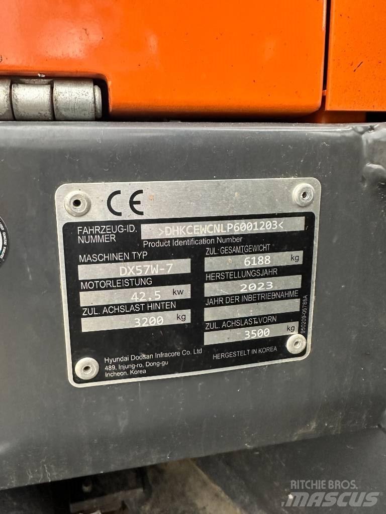 Develon DX 57 W-7 Ratasekskavaatorid