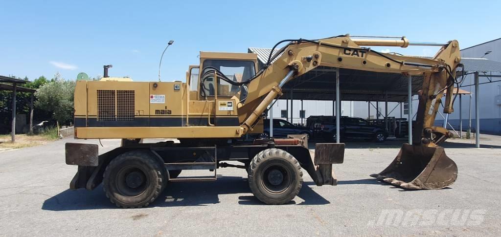 CAT 214 B Ratasekskavaatorid