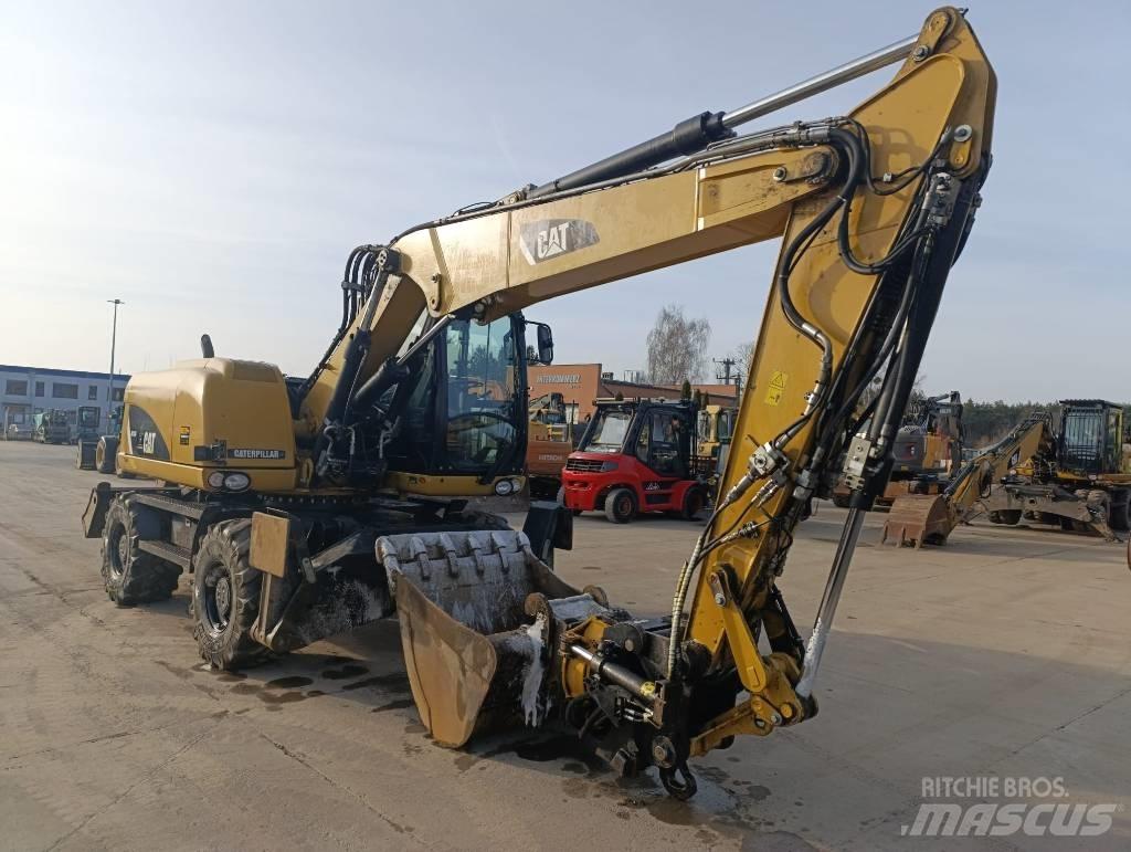 CAT M 313 D Ratasekskavaatorid