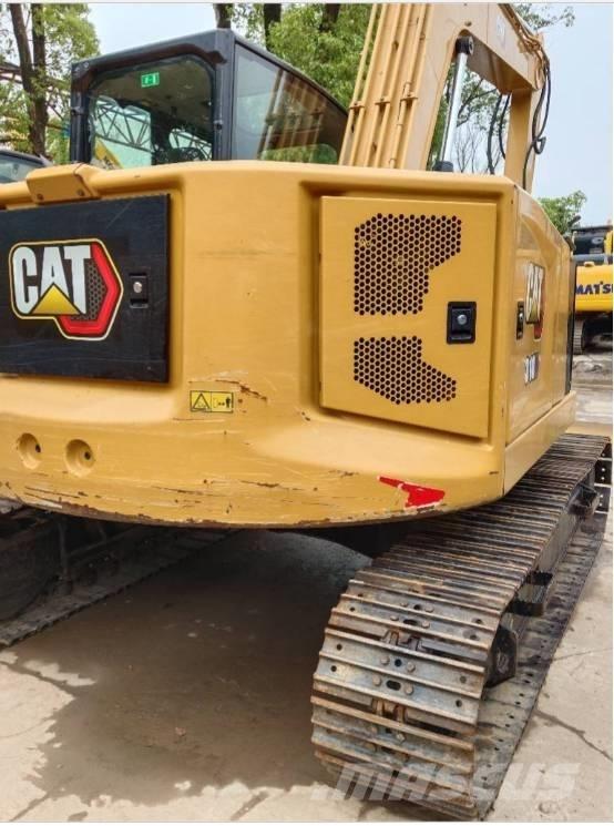 CAT 310 Roomikekskavaatorid