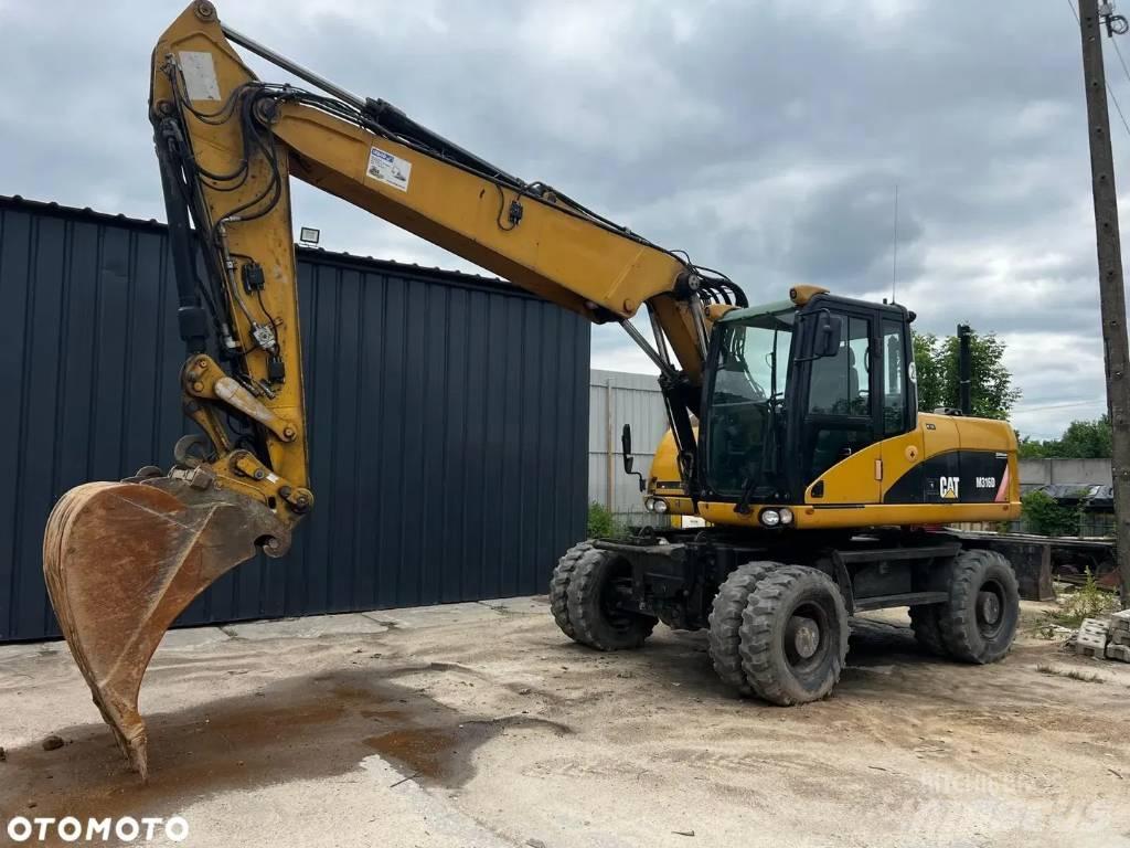 CAT M 316 D Ratasekskavaatorid