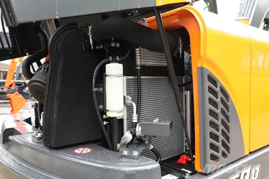 Develon DX 60 D Ratasekskavaatorid