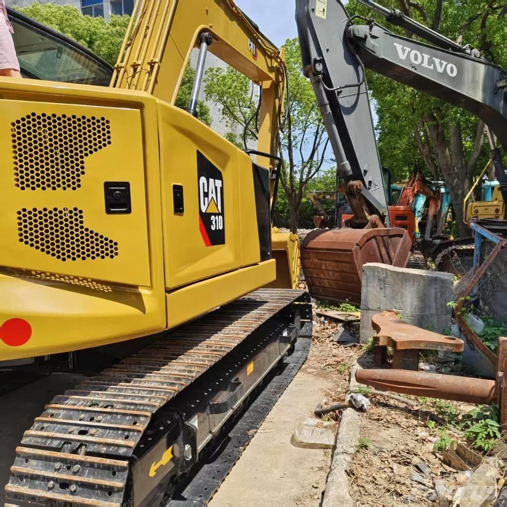CAT 310 Roomikekskavaatorid