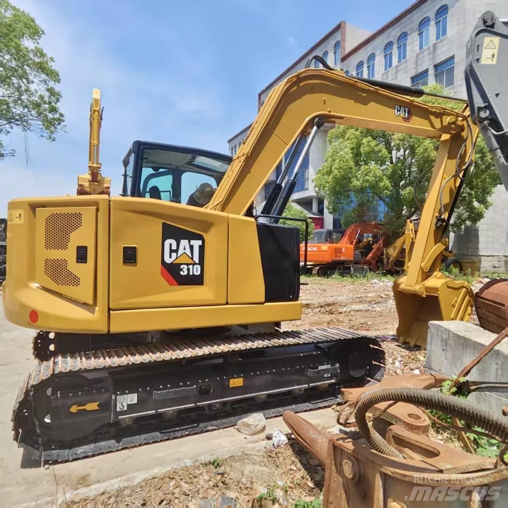 CAT 310 Roomikekskavaatorid