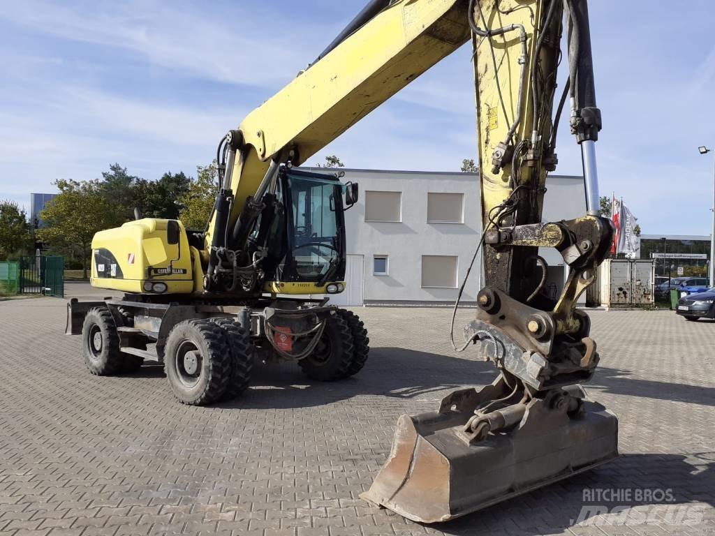 CAT M 322 D Ratasekskavaatorid