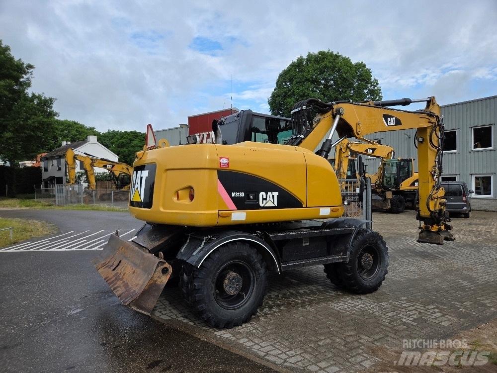 CAT M313D Ratasekskavaatorid