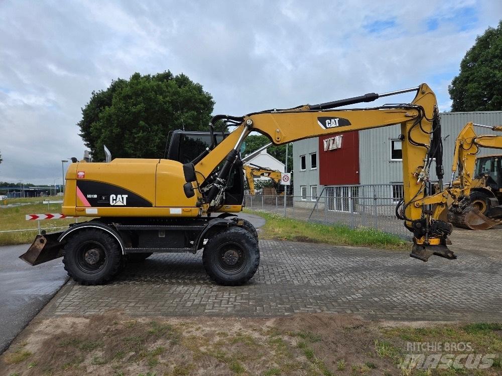 CAT M313D Ratasekskavaatorid