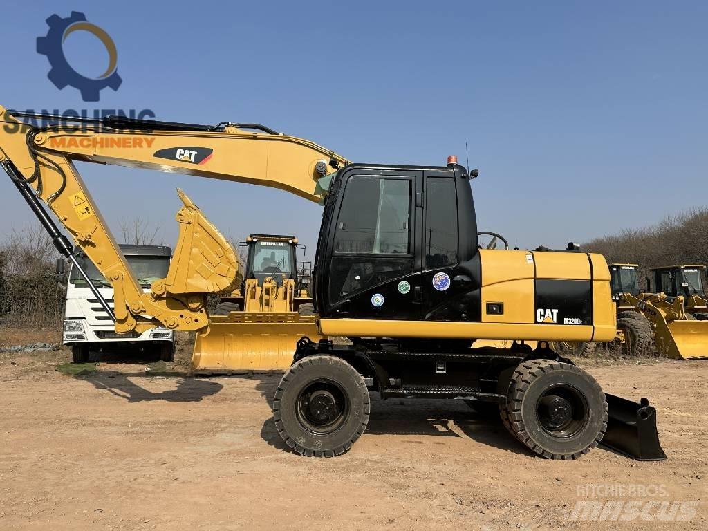 CAT M 320 D2 Ratasekskavaatorid