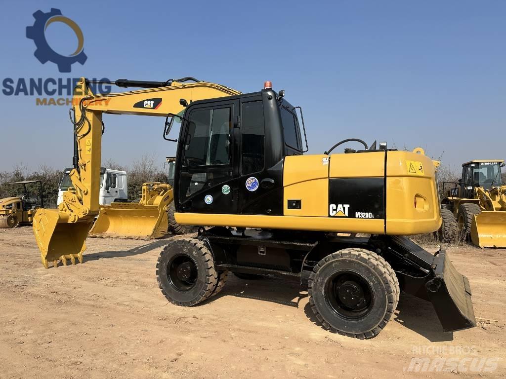 CAT M 320 D2 Ratasekskavaatorid
