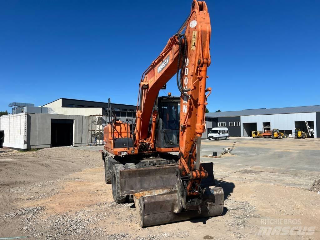 Doosan DX 140 W Ratasekskavaatorid