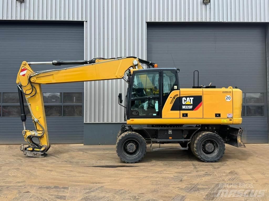 CAT M320F Ratasekskavaatorid