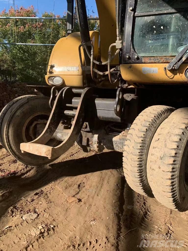 CAT 315 D Ratasekskavaatorid