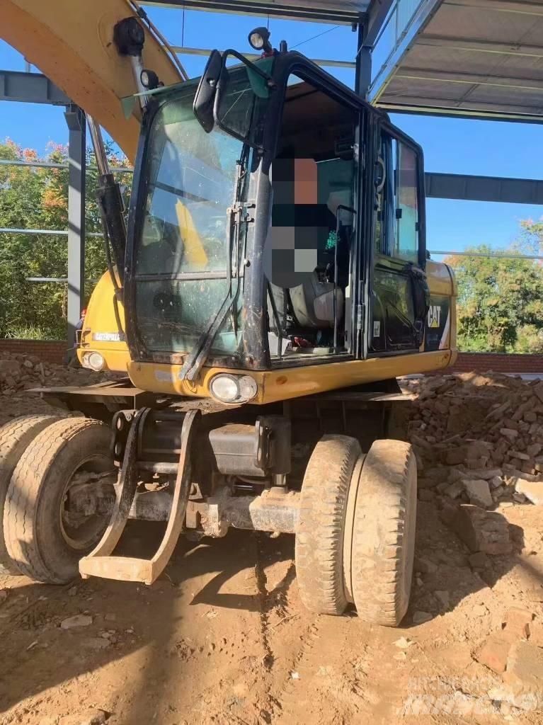 CAT 315 D Ratasekskavaatorid
