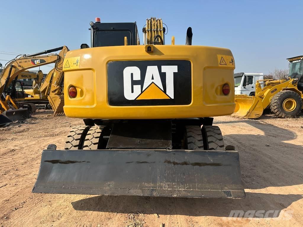 CAT M 320D Ratasekskavaatorid