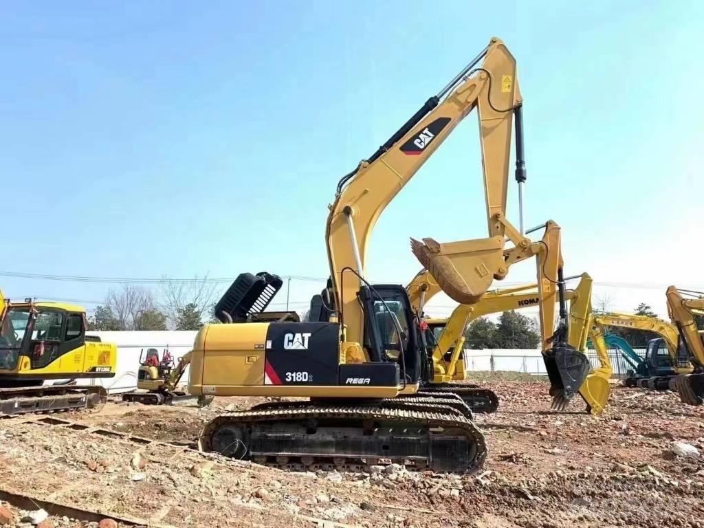 CAT CAT318D Roomikekskavaatorid
