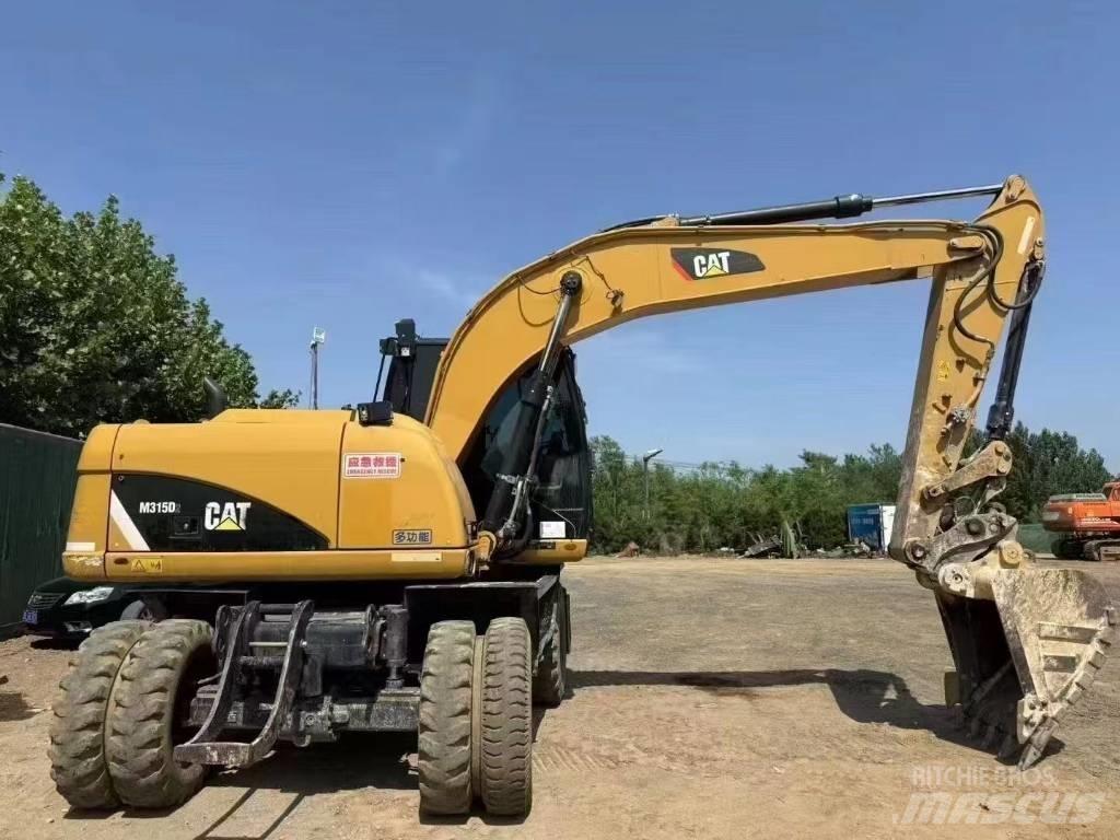 CAT M 315 D Ratasekskavaatorid