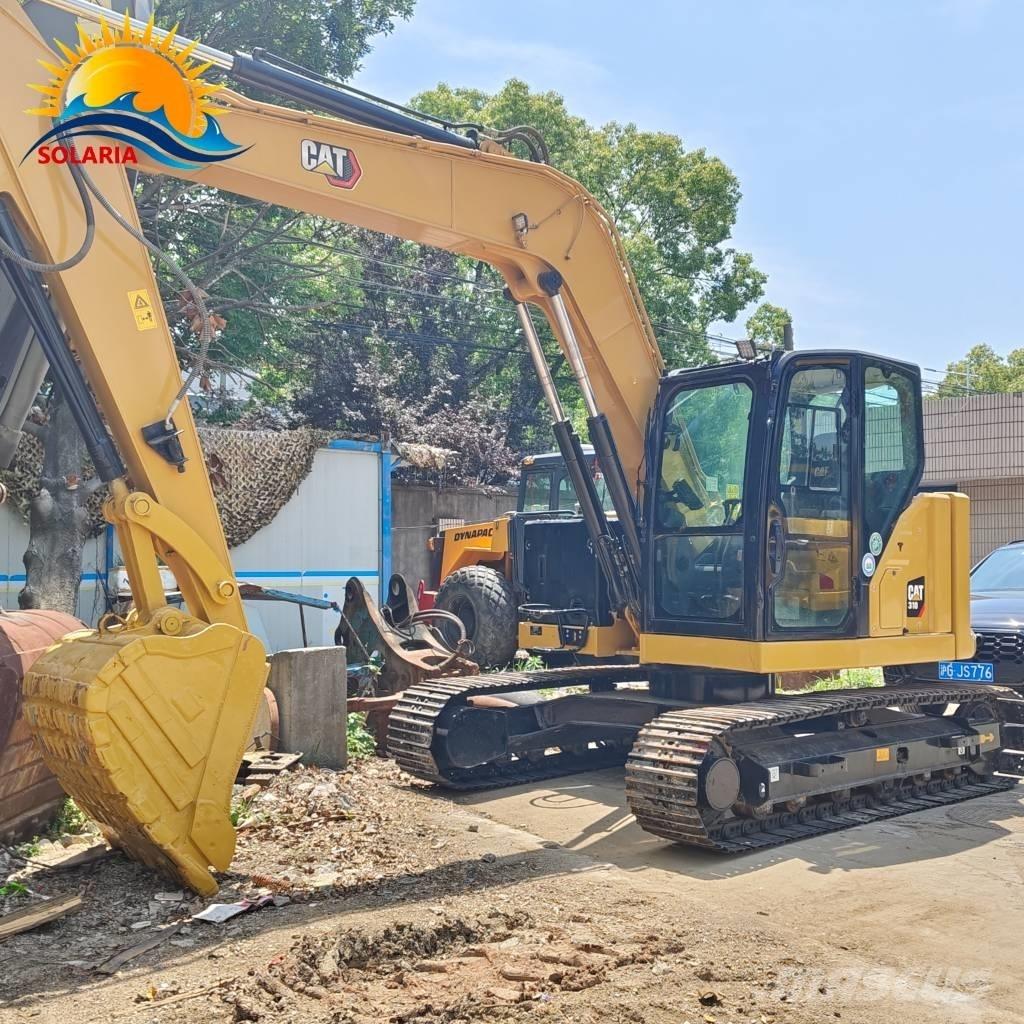 CAT 310 Roomikekskavaatorid