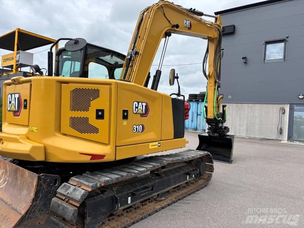 CAT 310 Roomikekskavaatorid