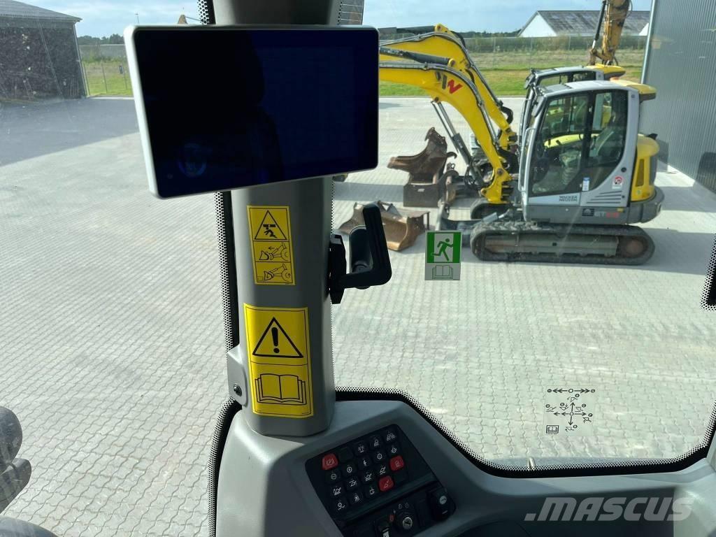 CASE 521 Rataslaadurid