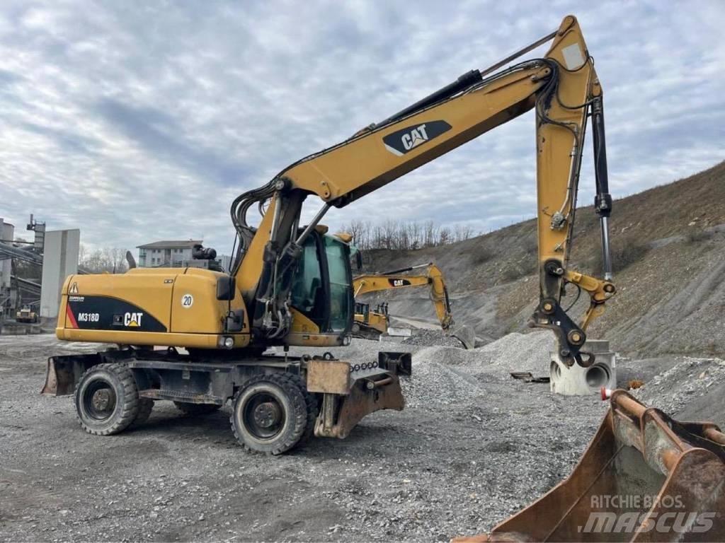 CAT M318D Ratasekskavaatorid