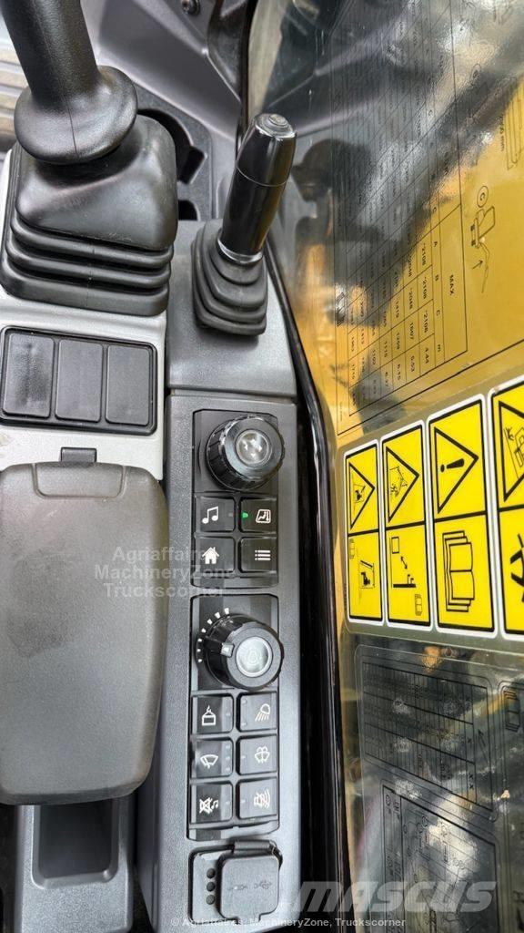 CAT 310 Roomikekskavaatorid