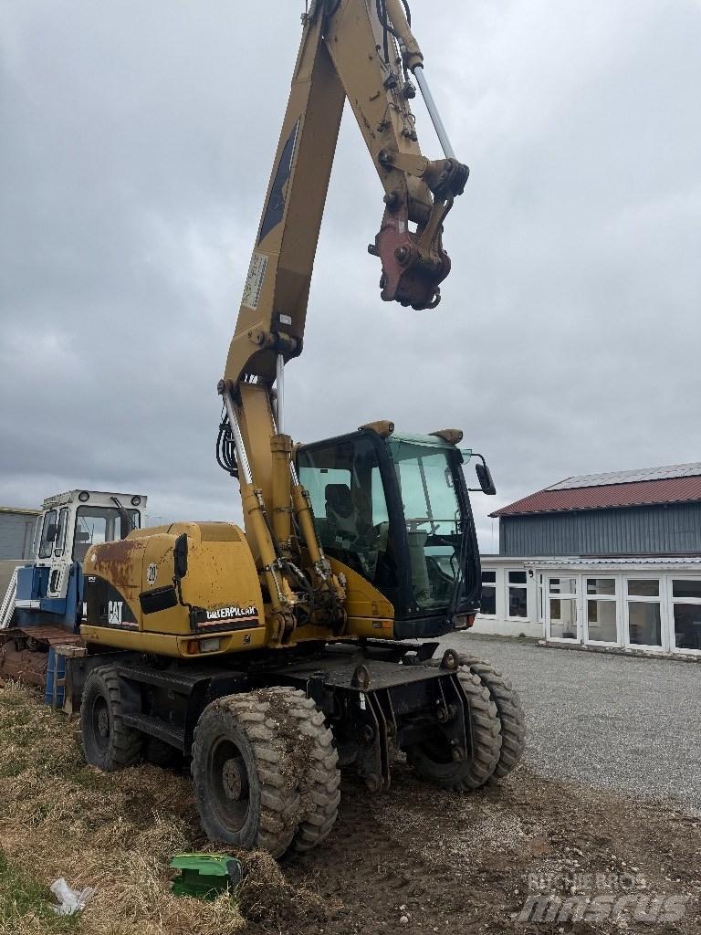 CAT M 313 C Ratasekskavaatorid