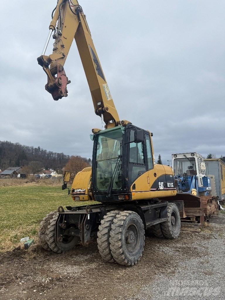 CAT M 313 C Ratasekskavaatorid