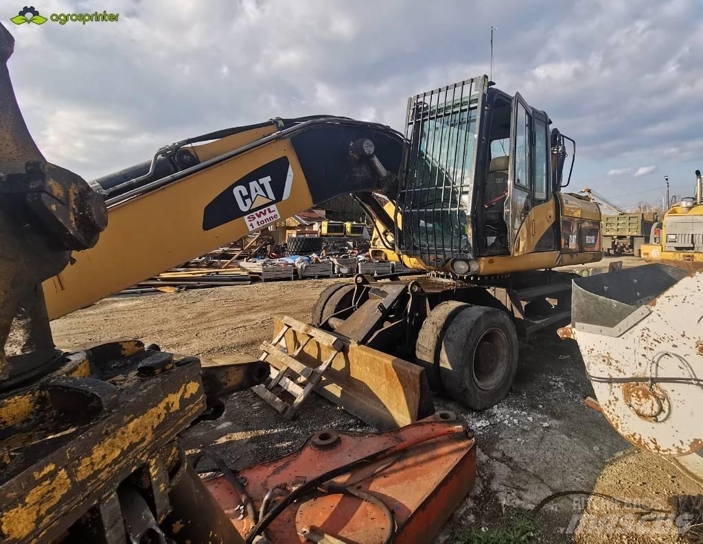 CAT M 318 D Materjalikäitlusmasinad