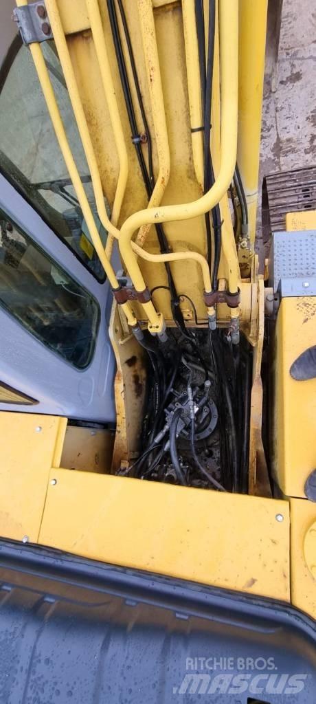 New Holland 215 B Roomikekskavaatorid