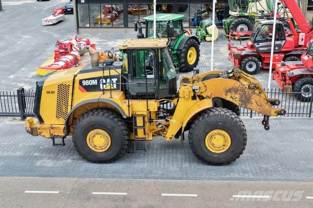 CAT 980M shovel + Bak Rataslaadurid