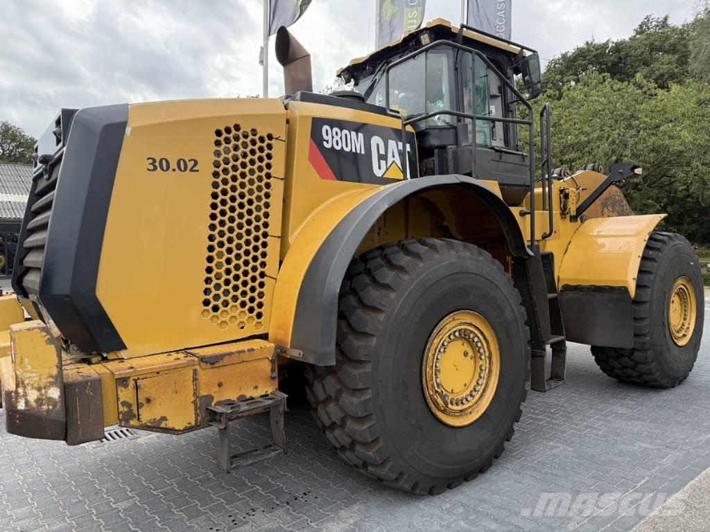CAT 980M shovel + Bak Rataslaadurid