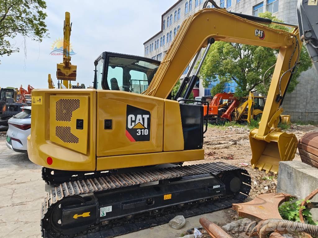 CAT 310 Roomikekskavaatorid