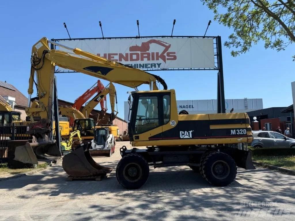 CAT M320 2001 Ratasekskavaatorid