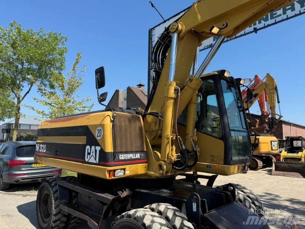 CAT M320 2001 Ratasekskavaatorid