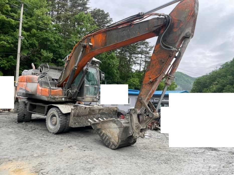 Doosan DX 210 W Ratasekskavaatorid