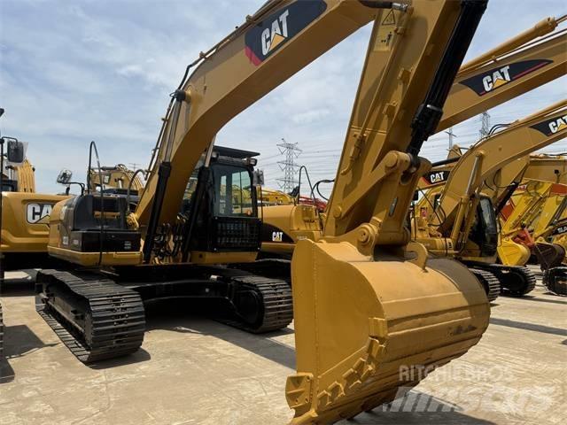 CAT 323 D L Roomikekskavaatorid