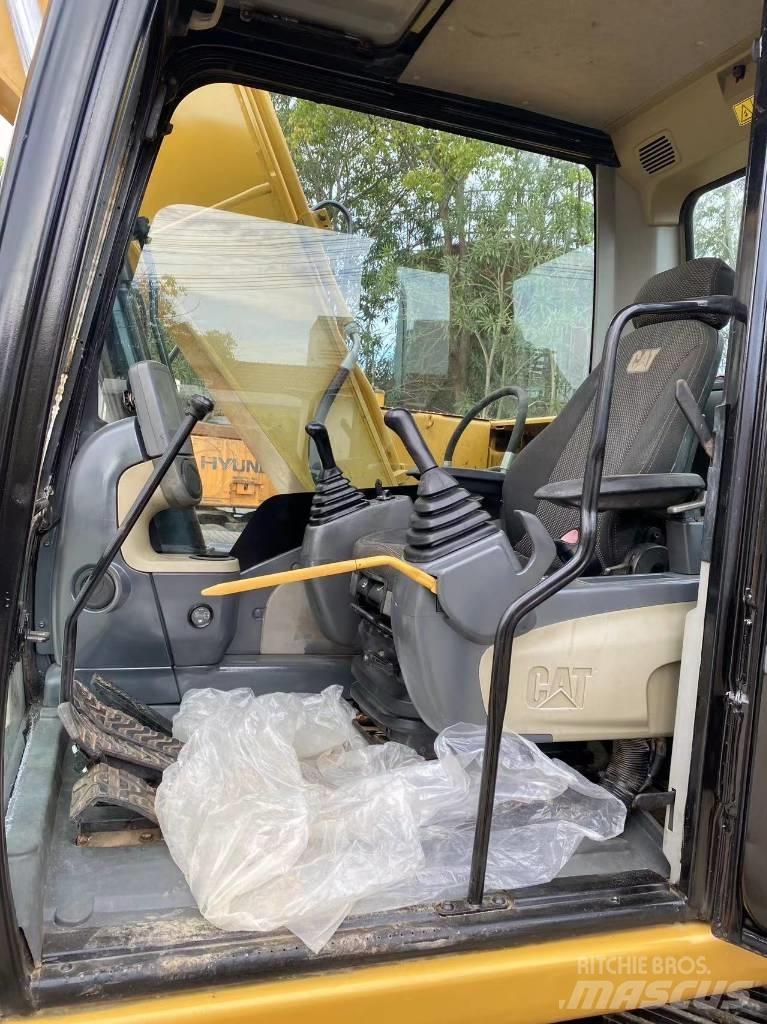 CAT 313 D Ratasekskavaatorid