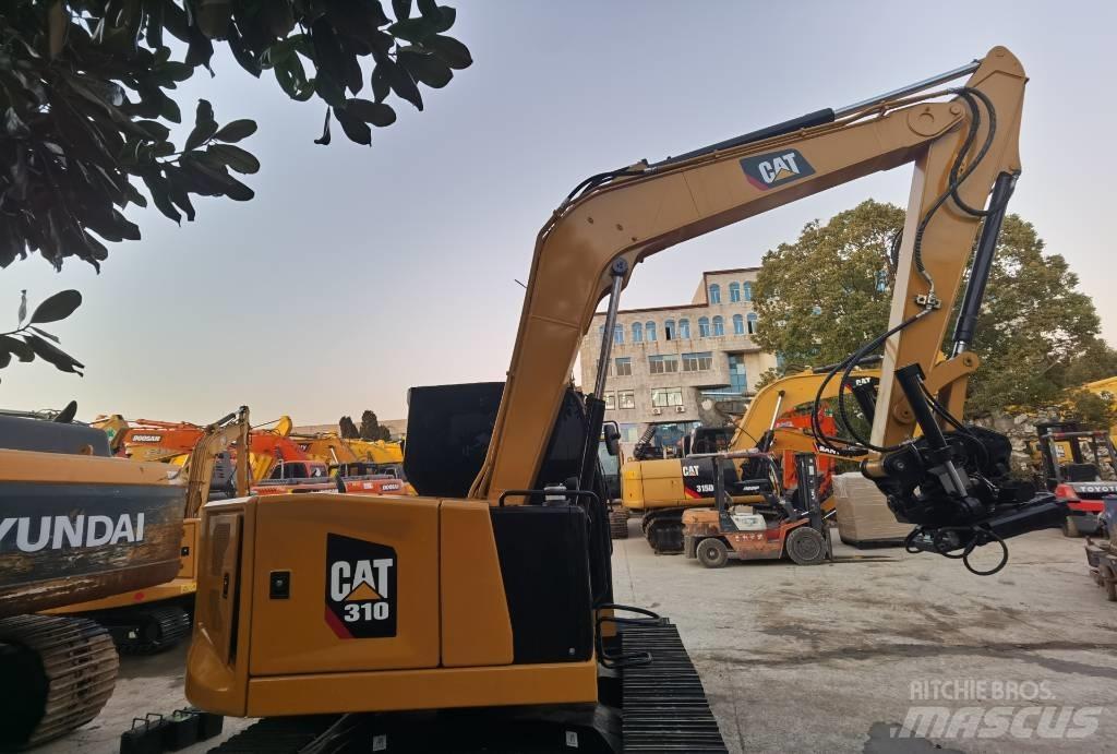 CAT 310 Roomikekskavaatorid