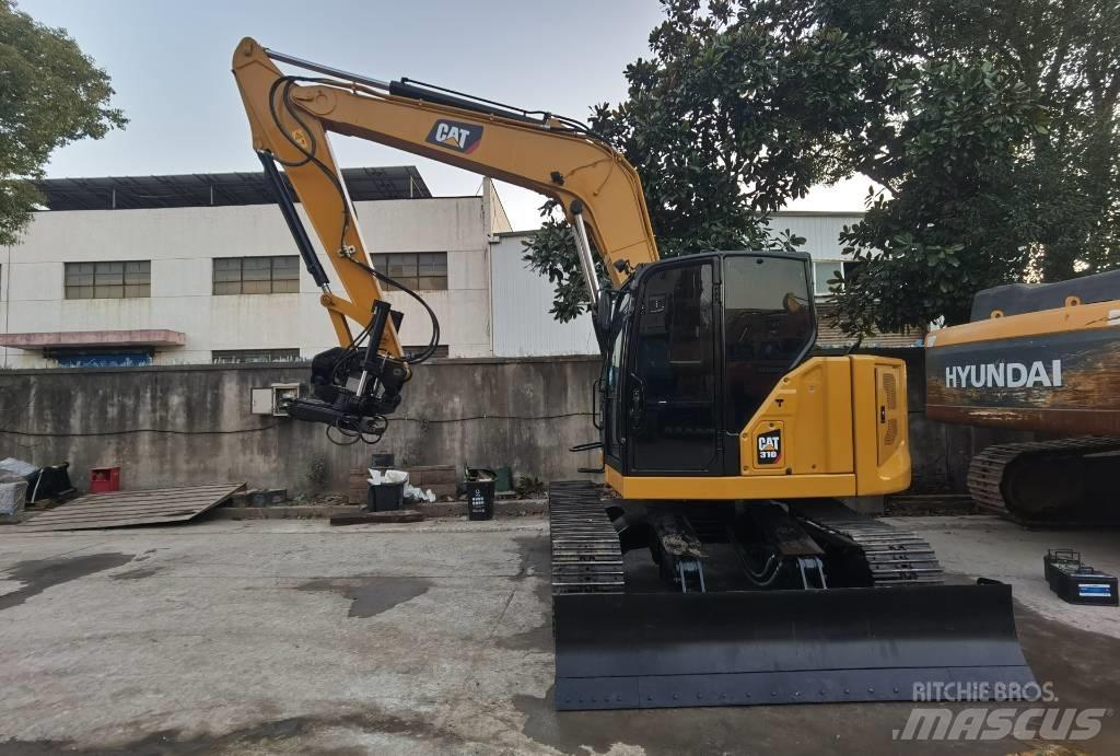 CAT 310 Roomikekskavaatorid