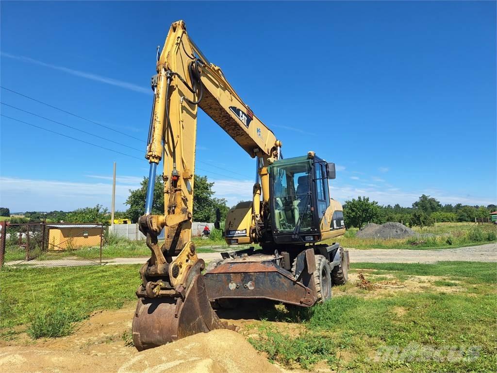 CAT M 318 C 4X4 Muu