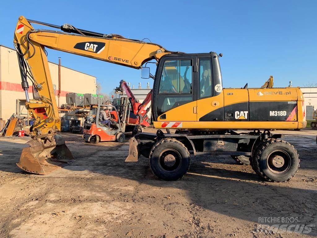 CAT M 318 D Ratasekskavaatorid