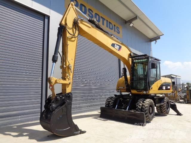 CAT M 318 D Ratasekskavaatorid