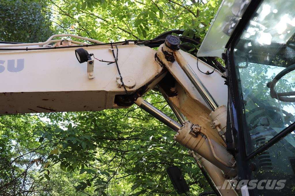 Komatsu PW 140-7 Ekskavaatorlaadurid