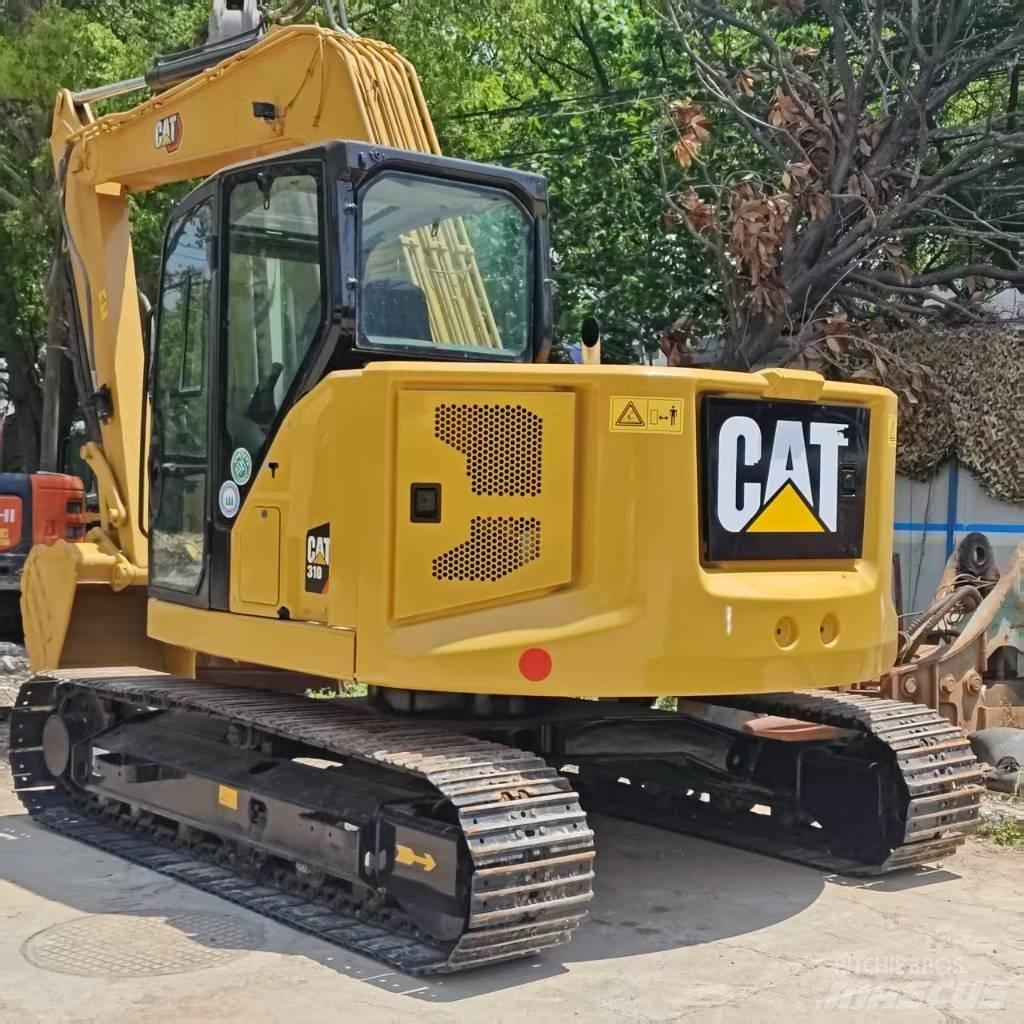 CAT 310 Väikeekskavaatorid 7t-12t