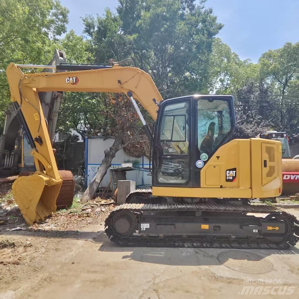 CAT 310 Väikeekskavaatorid 7t-12t