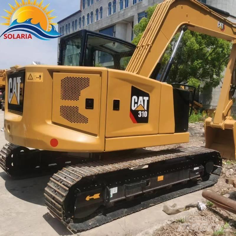 CAT 310 Roomikekskavaatorid