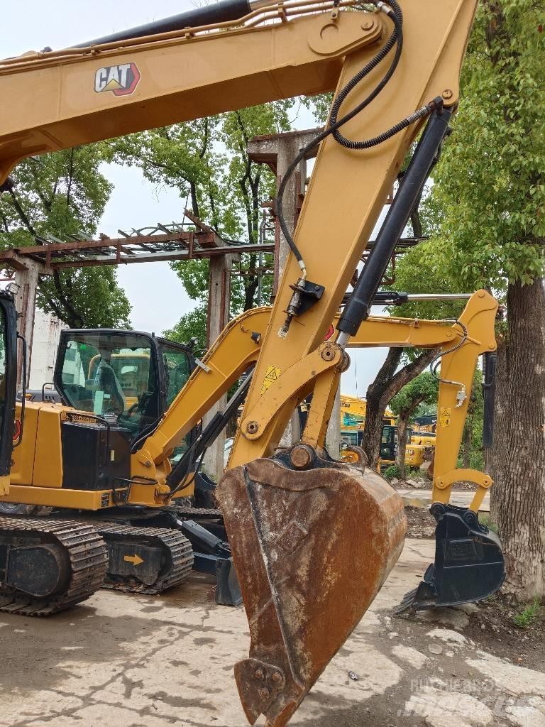 CAT 310 Roomikekskavaatorid