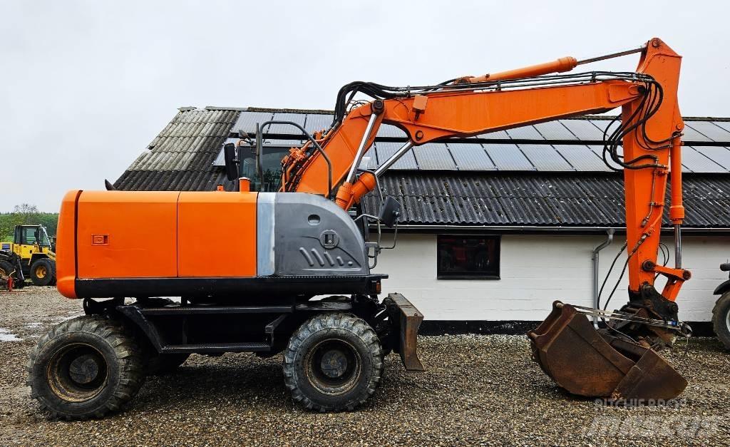 Hitachi ZX 140 W-3 Ratasekskavaatorid