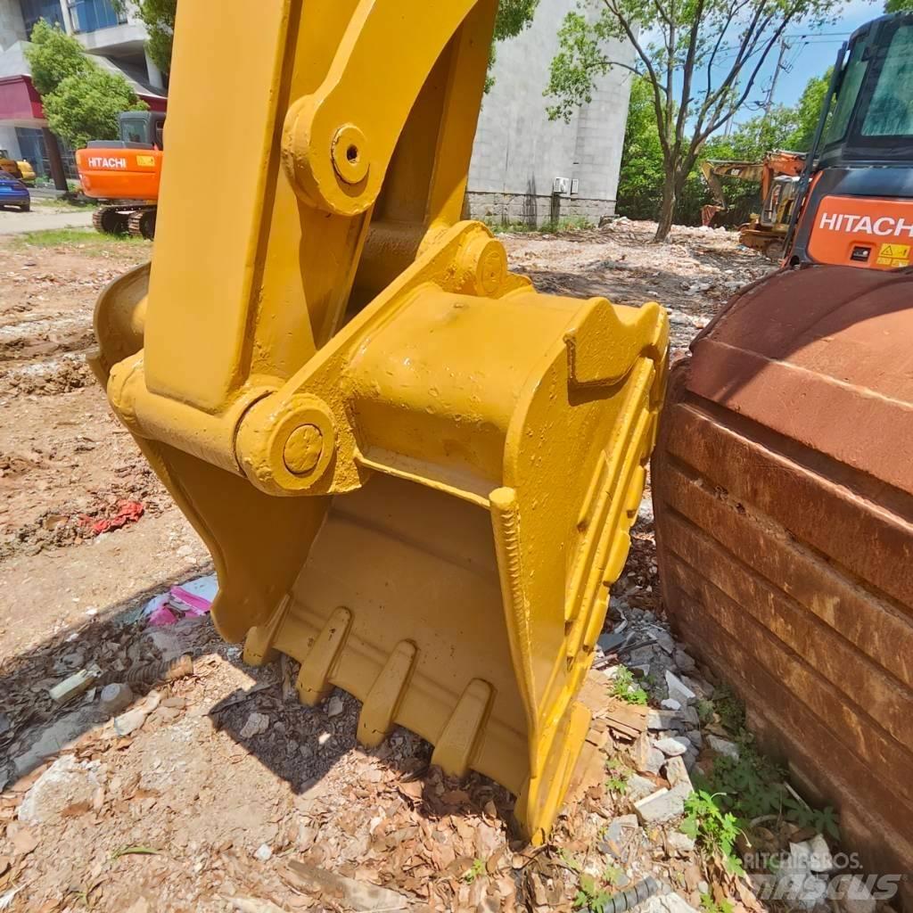 CAT 310 Roomikekskavaatorid
